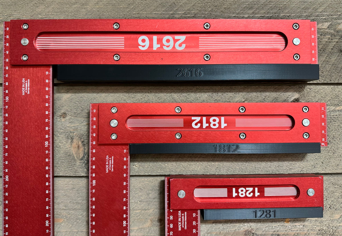 Close-up of Woodpeckers squares resting on numbered black wall hangers